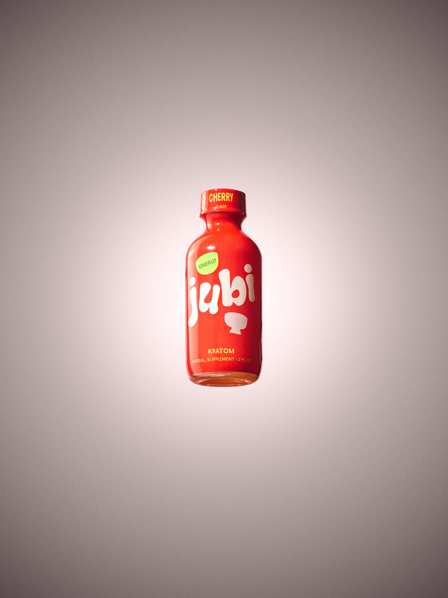 Jubi Cherry kratom shot with soft glow effect.