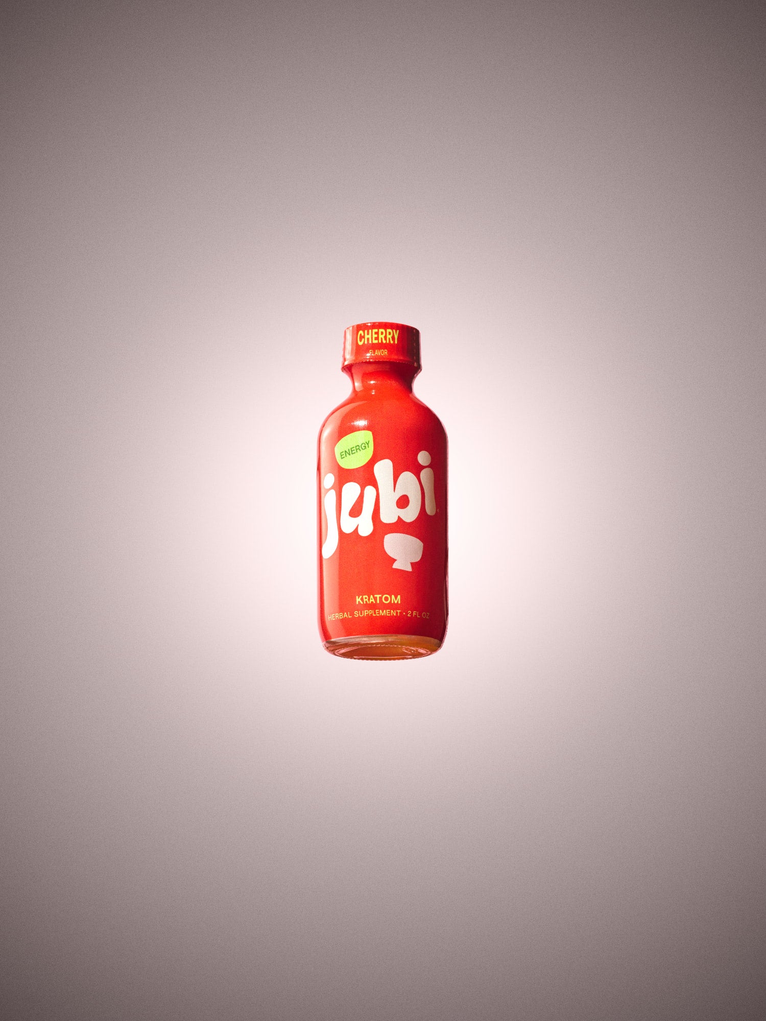 Jubi Cherry kratom shot with soft glow effect.